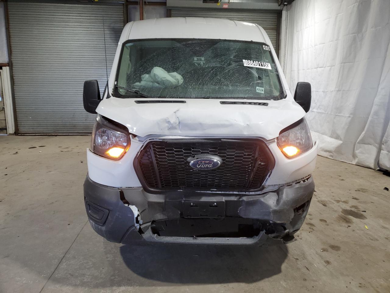 2023 Ford Transit VIN 1FTBR2C87PKC00819 Copart auction photo, front end / top/roof damage thumbnail 5