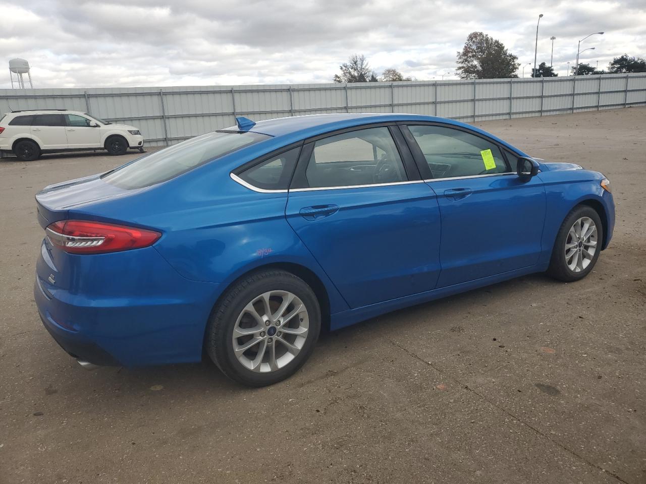 2019 Ford Fusion VIN 3FA6P0HDXKR281732 Copart auction photo, side / minor dent/scratches damage thumbnail 3