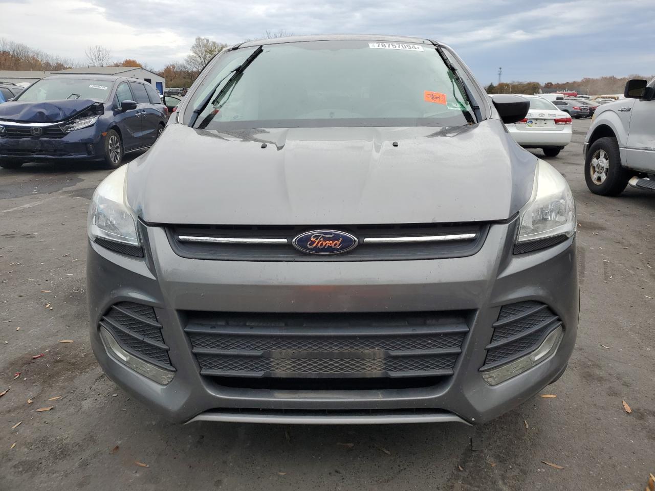 2014 Ford Escape VIN 1FMCU0GX3EUC34116 Copart auction photo, side / front end damage thumbnail 5