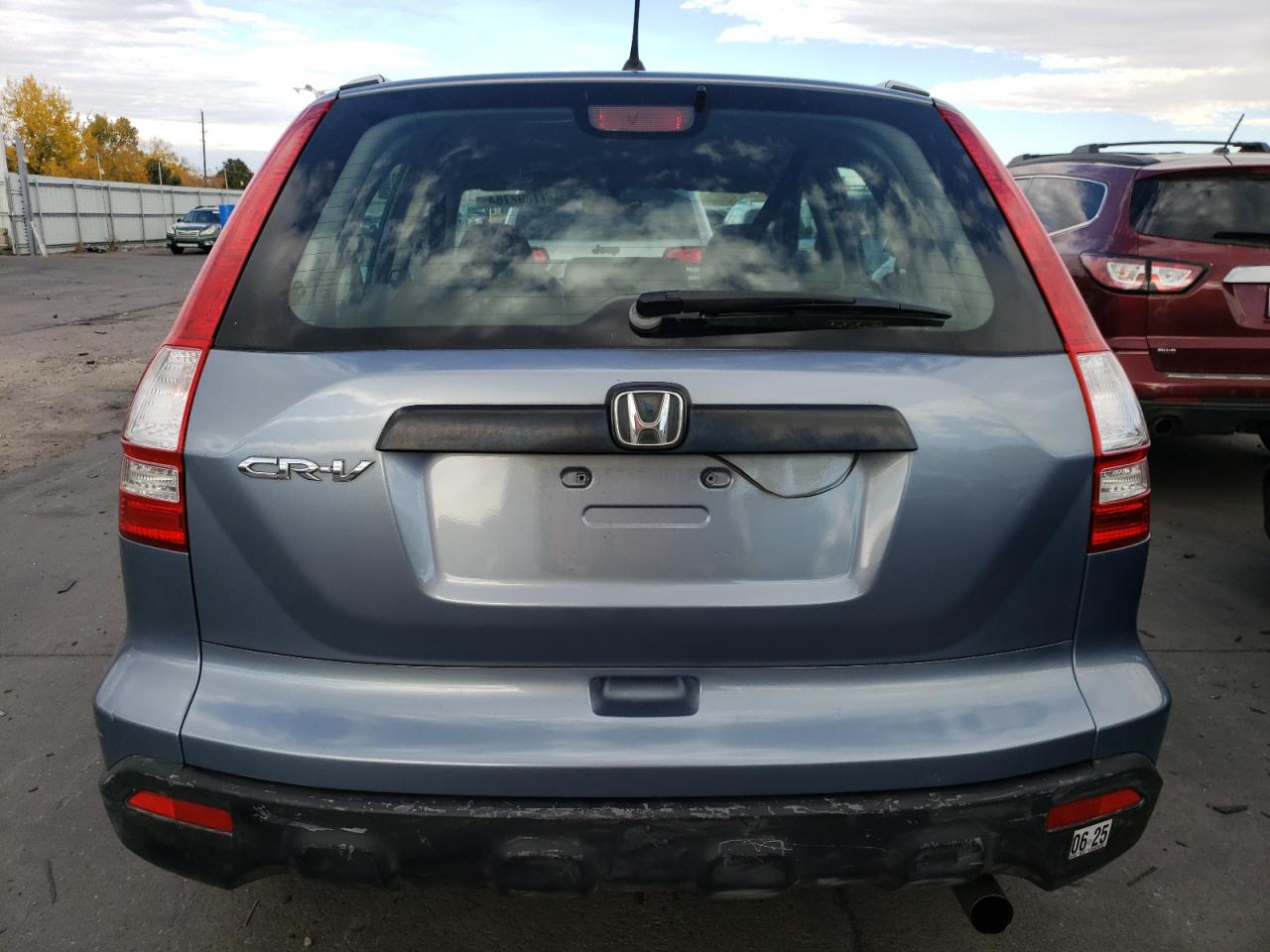 2007 Honda CR-V VIN JHLRE38327C057627 Copart auction photo, side / rear end damage thumbnail 6