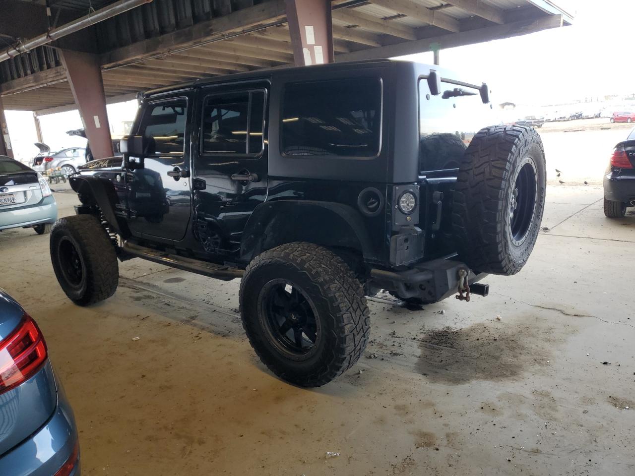 2015 Jeep Wrangler VIN 1C4BJWDG3FL524878 Copart auction photo, all over damage thumbnail 2