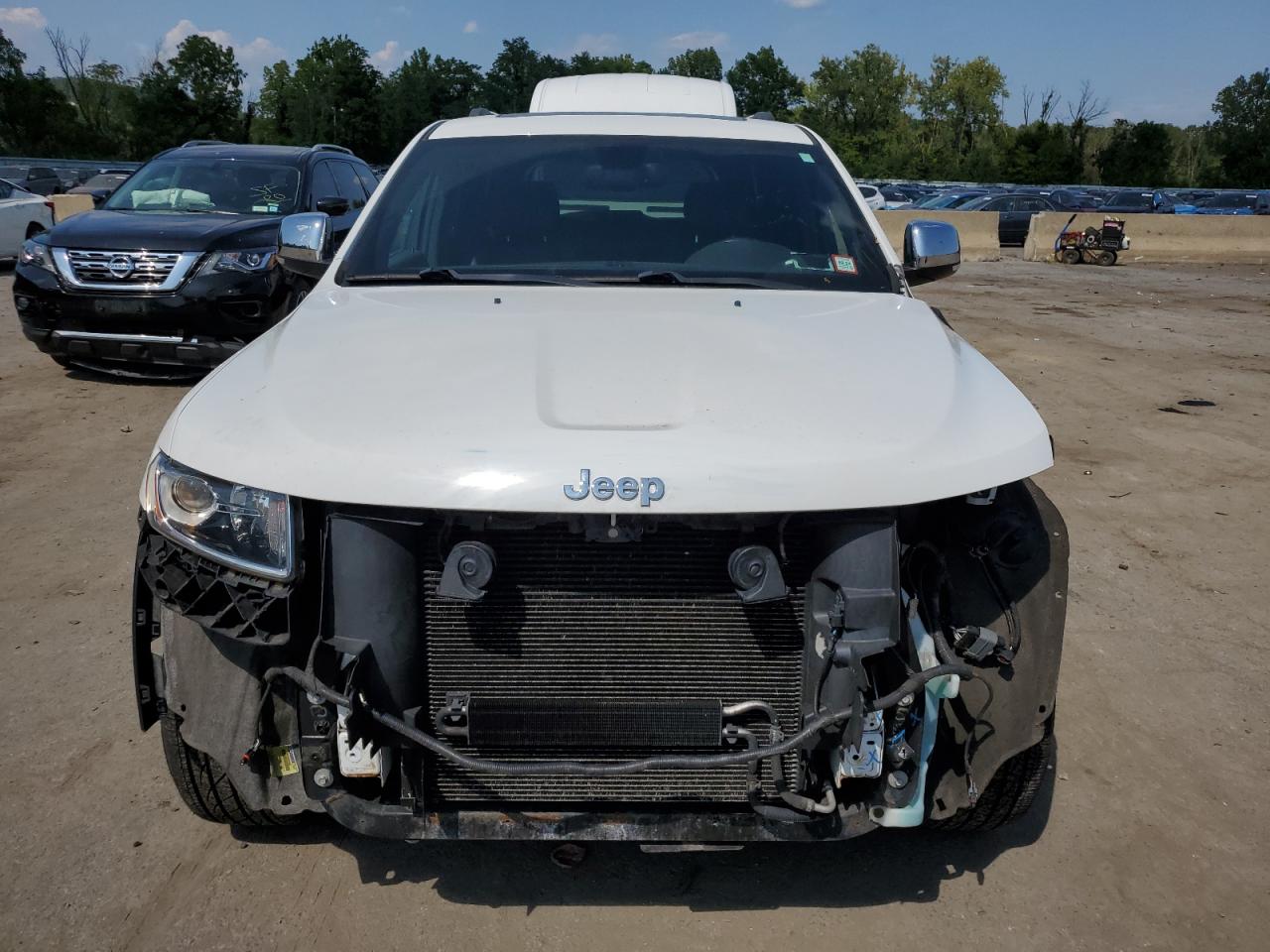 2014 Jeep Grand Cherokee VIN 1C4RJFBG2EC121152 Copart auction photo, front end / minor dent/scratches damage thumbnail 5