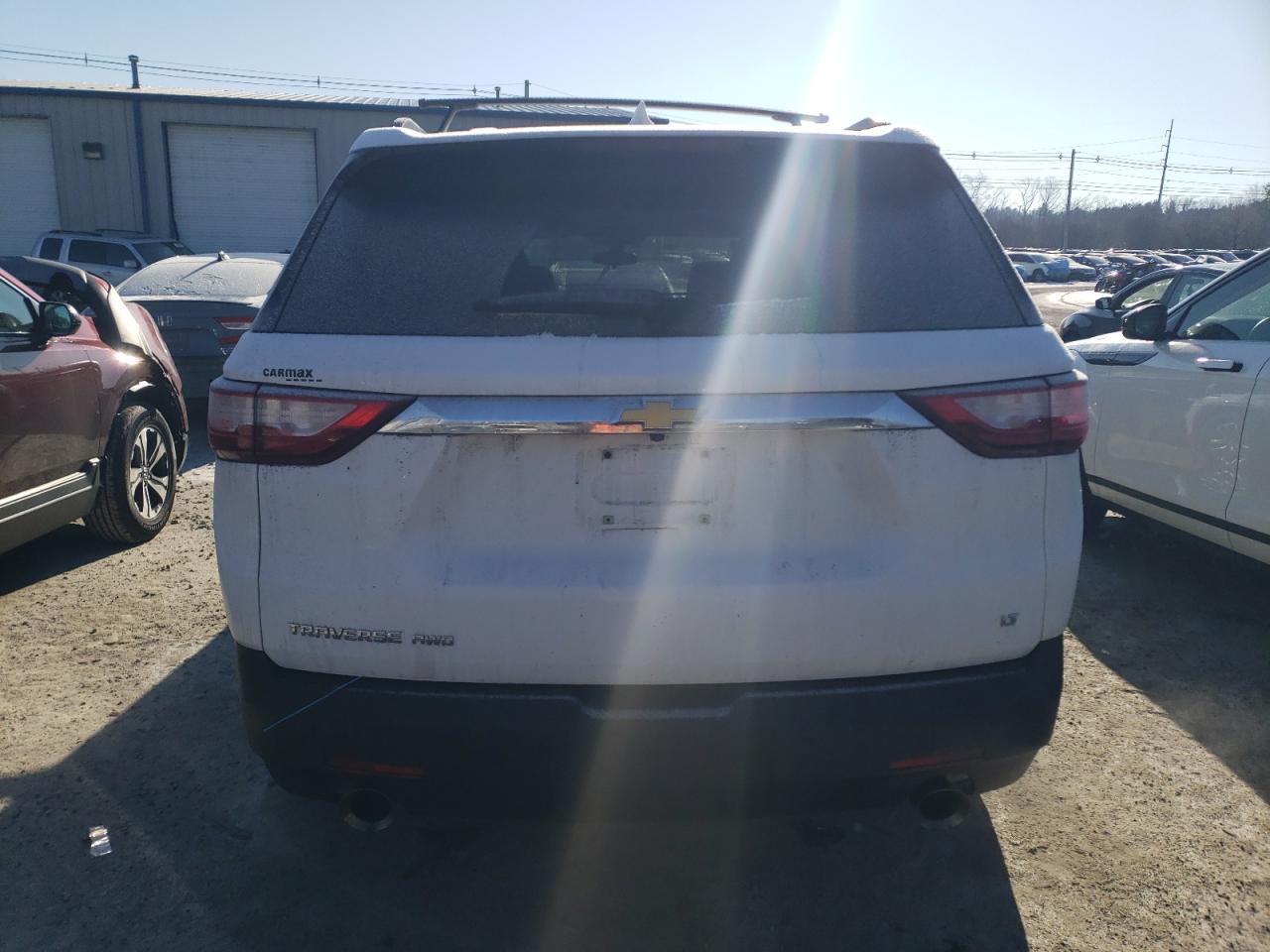 2019 Chevrolet Traverse VIN 1GNEVGKW0KJ304175 Copart auction photo, side / front end damage thumbnail 6