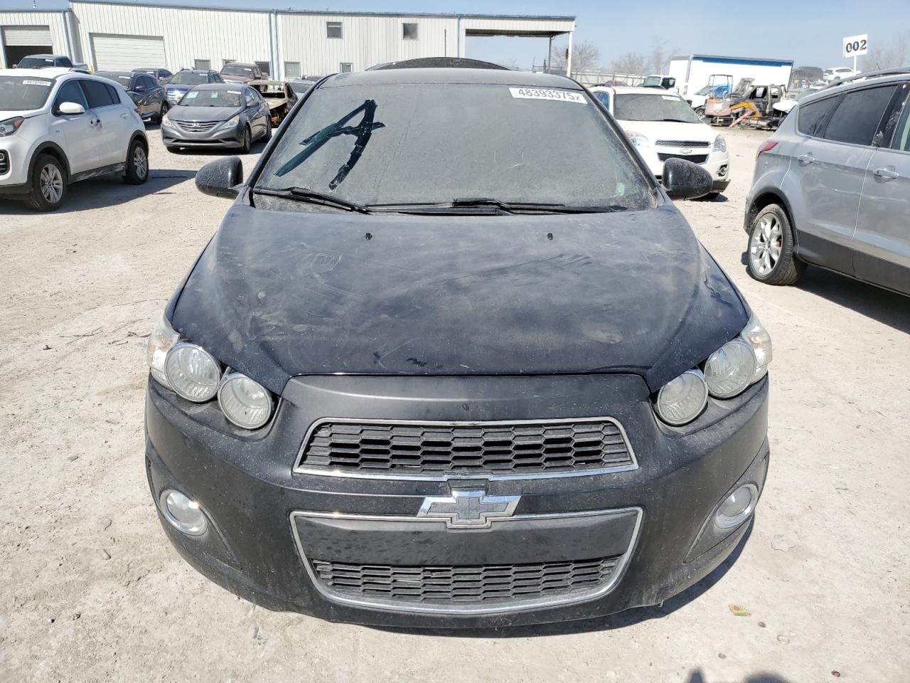 2015 Chevrolet Sonic VIN 1G1JE5SB8F4145170 Copart auction photo, vandalism / minor dent/scratches damage thumbnail 5