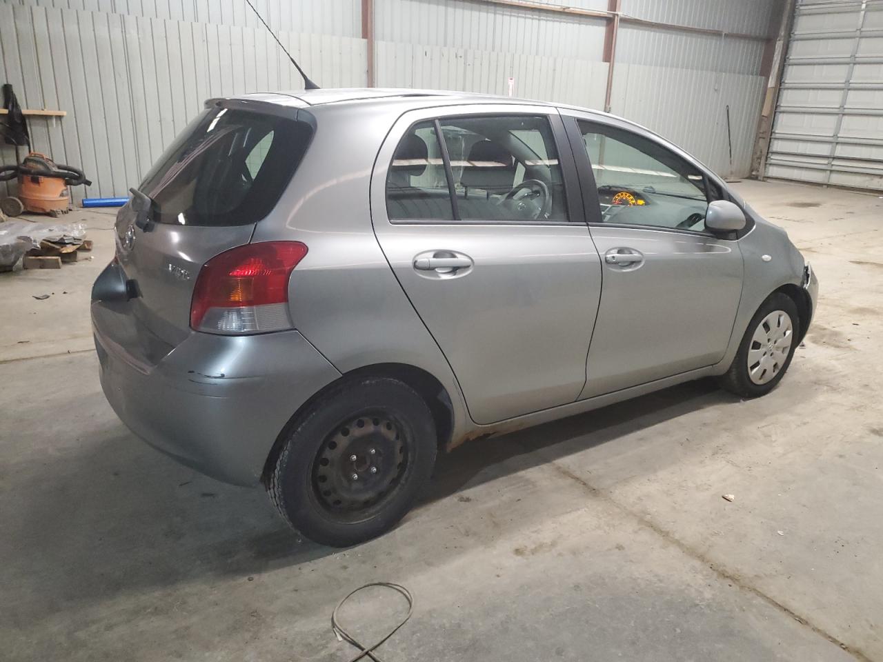 2009 Toyota Yaris VIN JTDKT903495239209 Copart auction photo, front end damage thumbnail 3