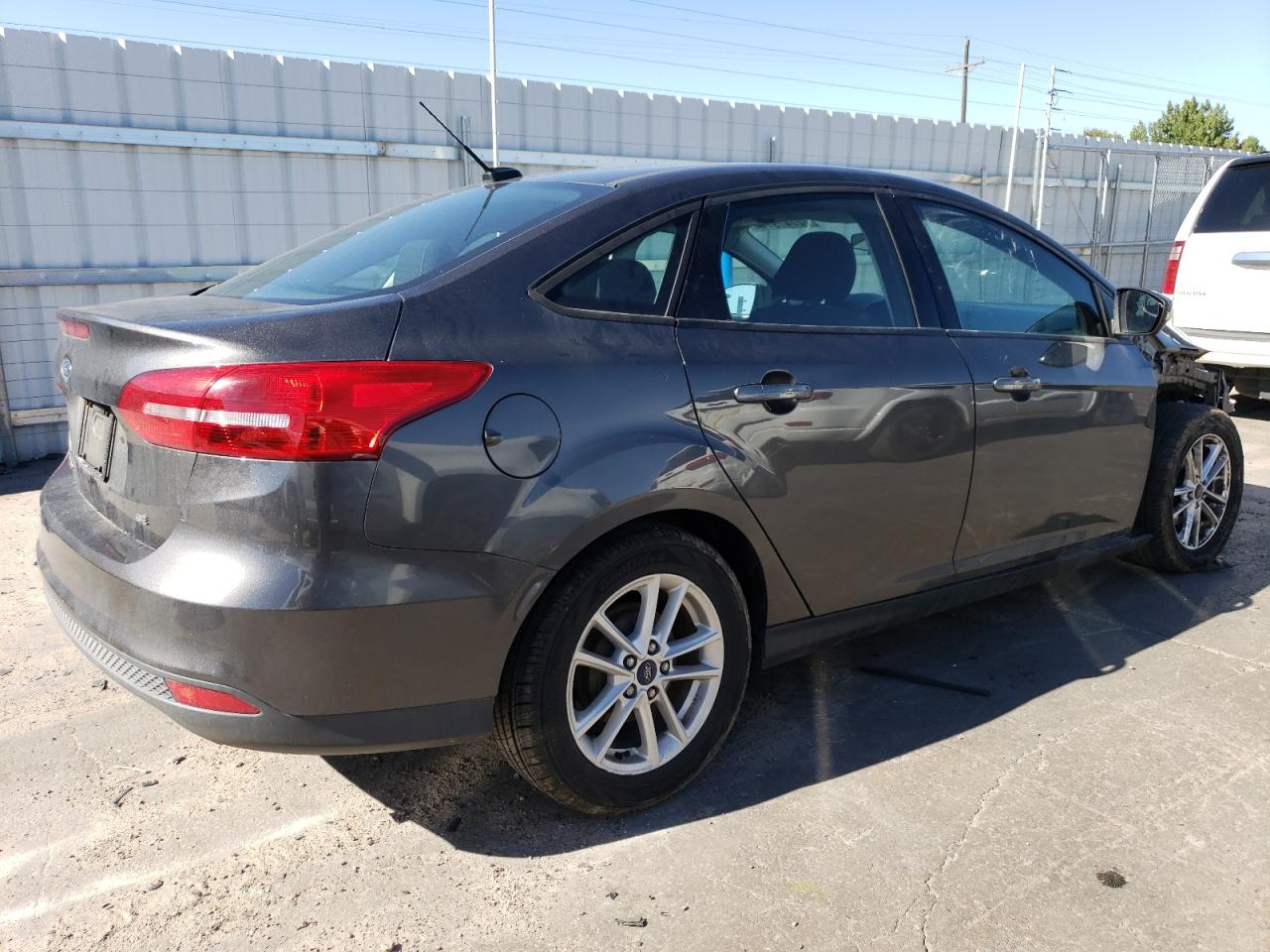 2016 Ford Focus VIN 1FADP3F26GL297782 Copart auction photo, front end / hail damage thumbnail 3