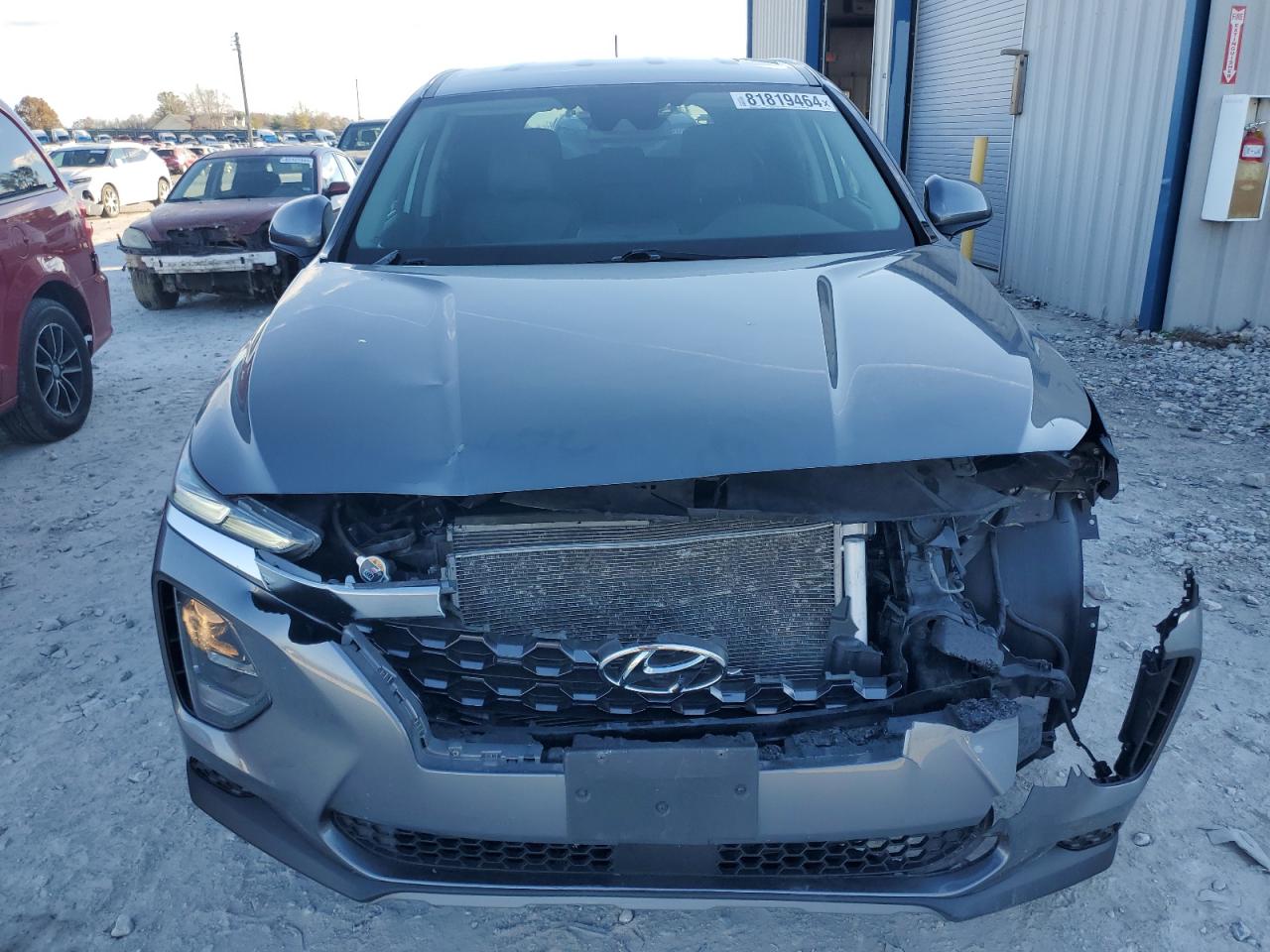2019 Hyundai Santa Fe VIN 5NMS23AD6KH009634 Copart auction photo, front end damage thumbnail 5