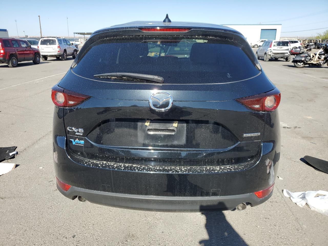 2021 Mazda CX-5 VIN JM3KFBCM4M1397575 Copart auction photo, all over damage thumbnail 6