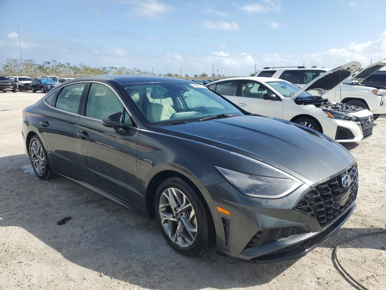 2023 Hyundai Sonata VIN KMHL64JA6PA306923 Copart auction photo, water/flood damage thumbnail 4
