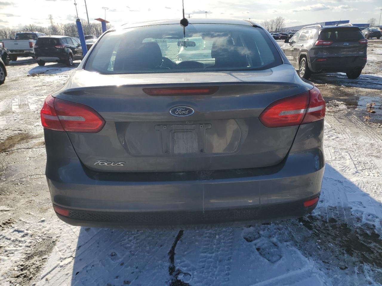 2017 Ford Focus VIN 1FADP3E29HL313122 Copart auction photo, front end / side damage thumbnail 6