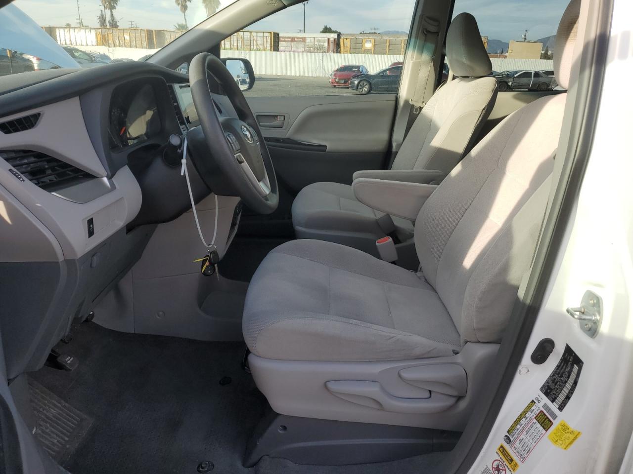 2015 Toyota Sienna VIN 5TDZK3DC1FS559439 Copart auction photo, rear end damage thumbnail 7