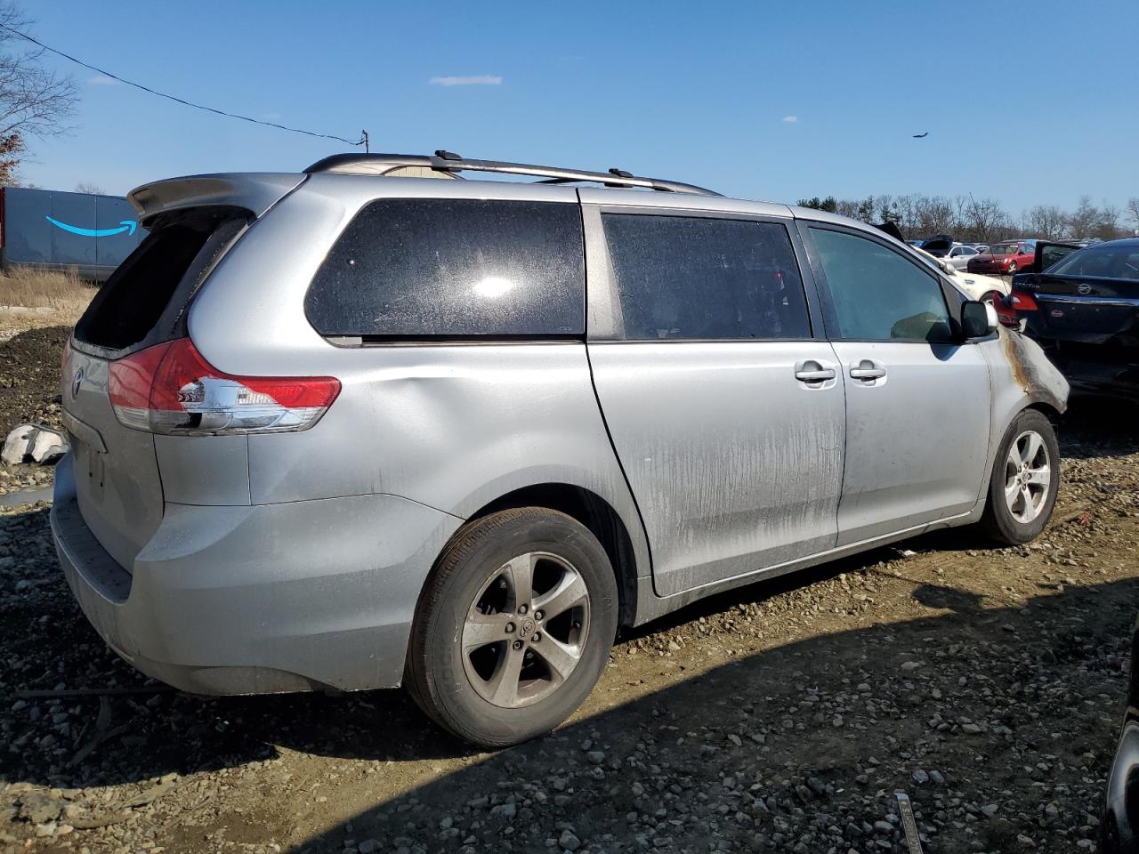 2011 Toyota Sienna VIN 5TDKK3DC3BS153884 Copart auction photo, burn damage thumbnail 3