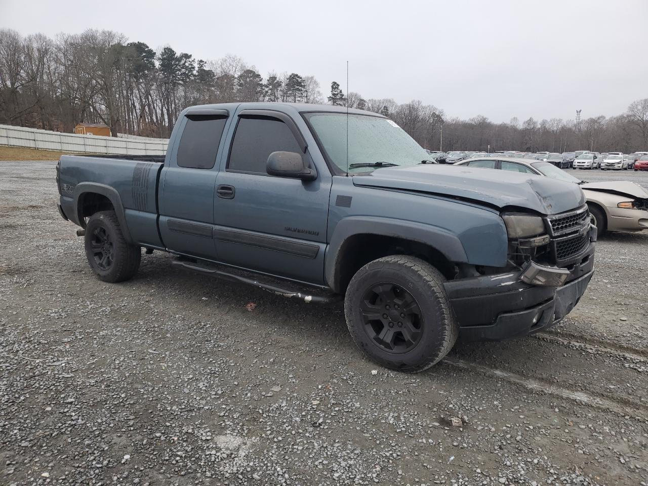 2006 Chevrolet Silverado VIN 1GCEK19Z46Z246688 Copart auction photo, front end / minor dent/scratches damage thumbnail 4