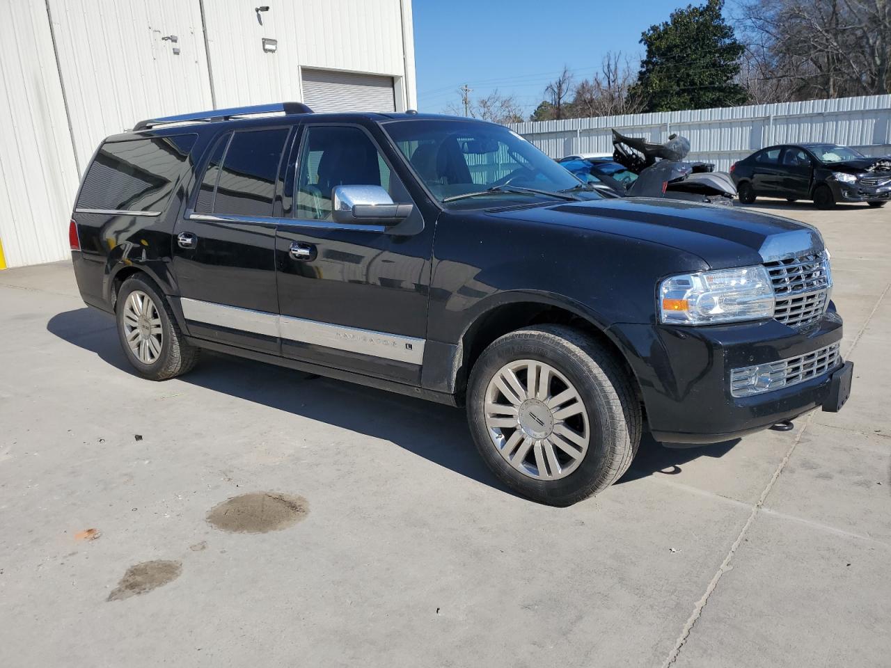 2012 Lincoln Navigator VIN 5LMJJ3J51CEL08176 Copart auction photo, all over damage thumbnail 4