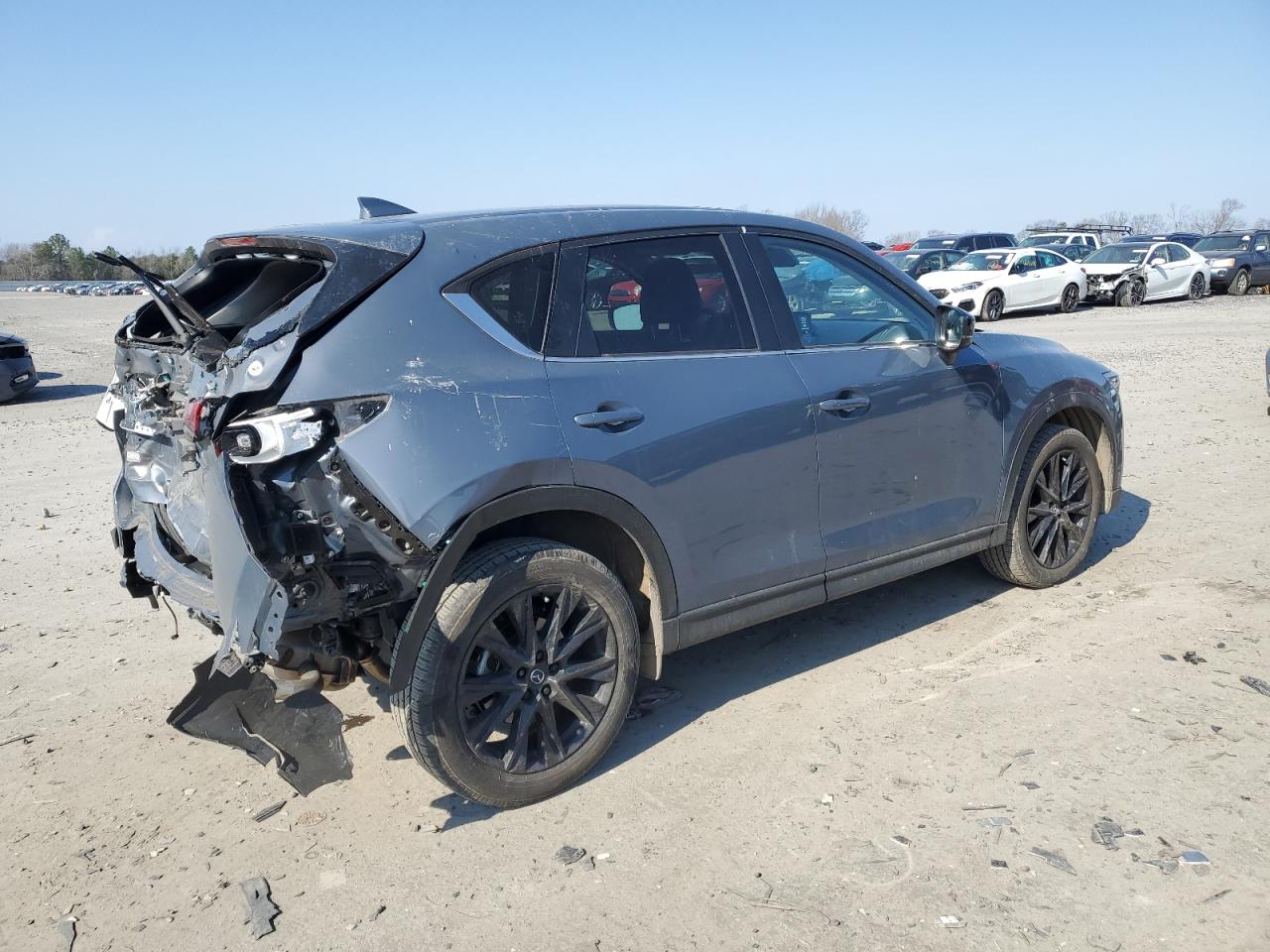 2022 Mazda CX-5 VIN JM3KFBCM1N1624397 Copart auction photo, rear end damage thumbnail 3