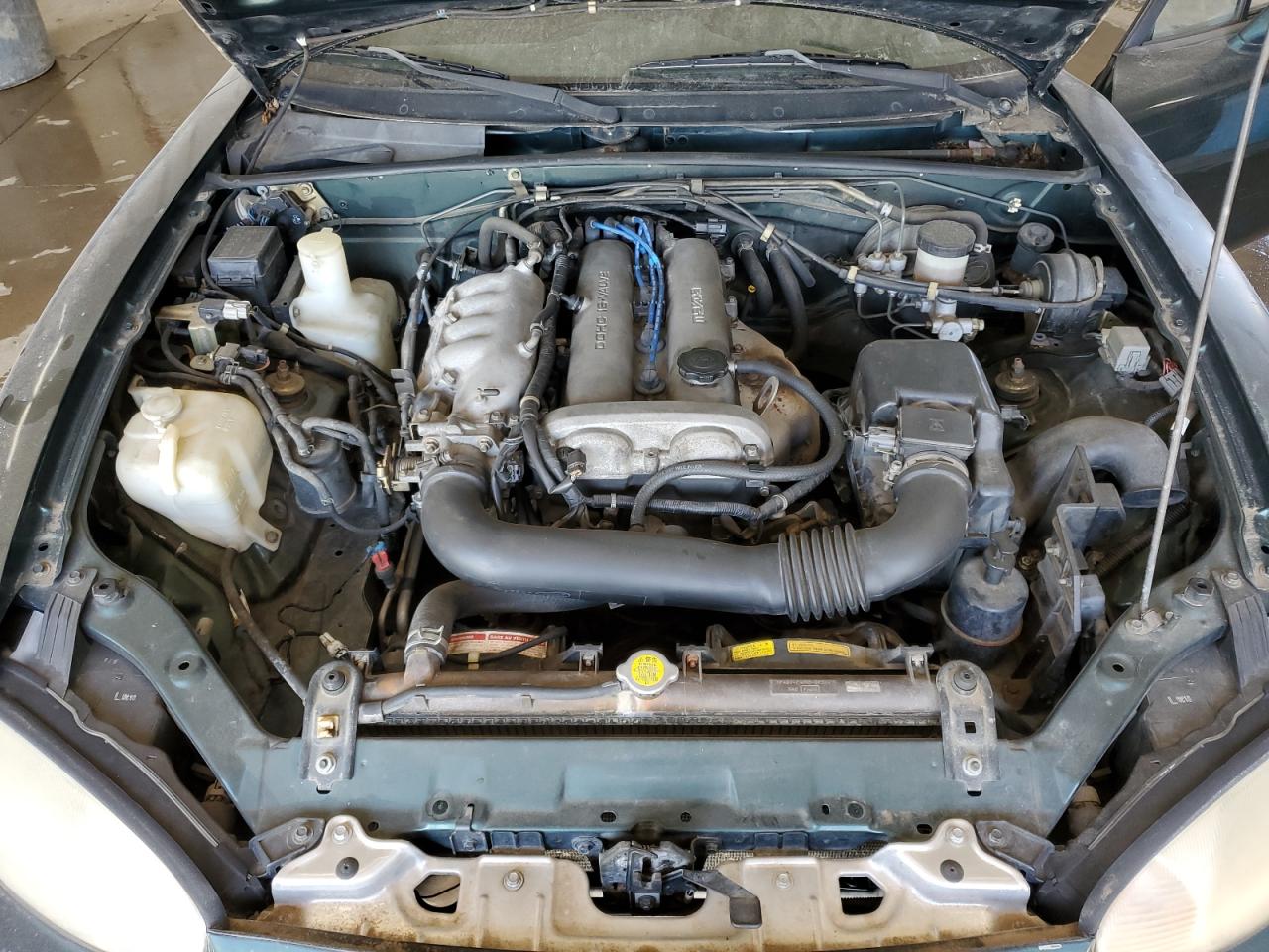 2000 Mazda MX-5 VIN JM1NB3534Y0155537 Copart auction photo, rear end / minor dent/scratches damage thumbnail 11