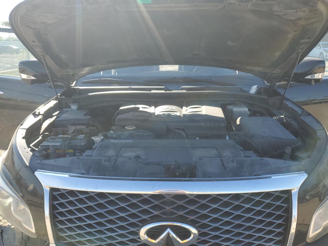 2016 Infiniti QX80 VIN JN8AZ2NF0G9611241 Copart auction photo, front end / minor dent/scratches damage thumbnail 14
