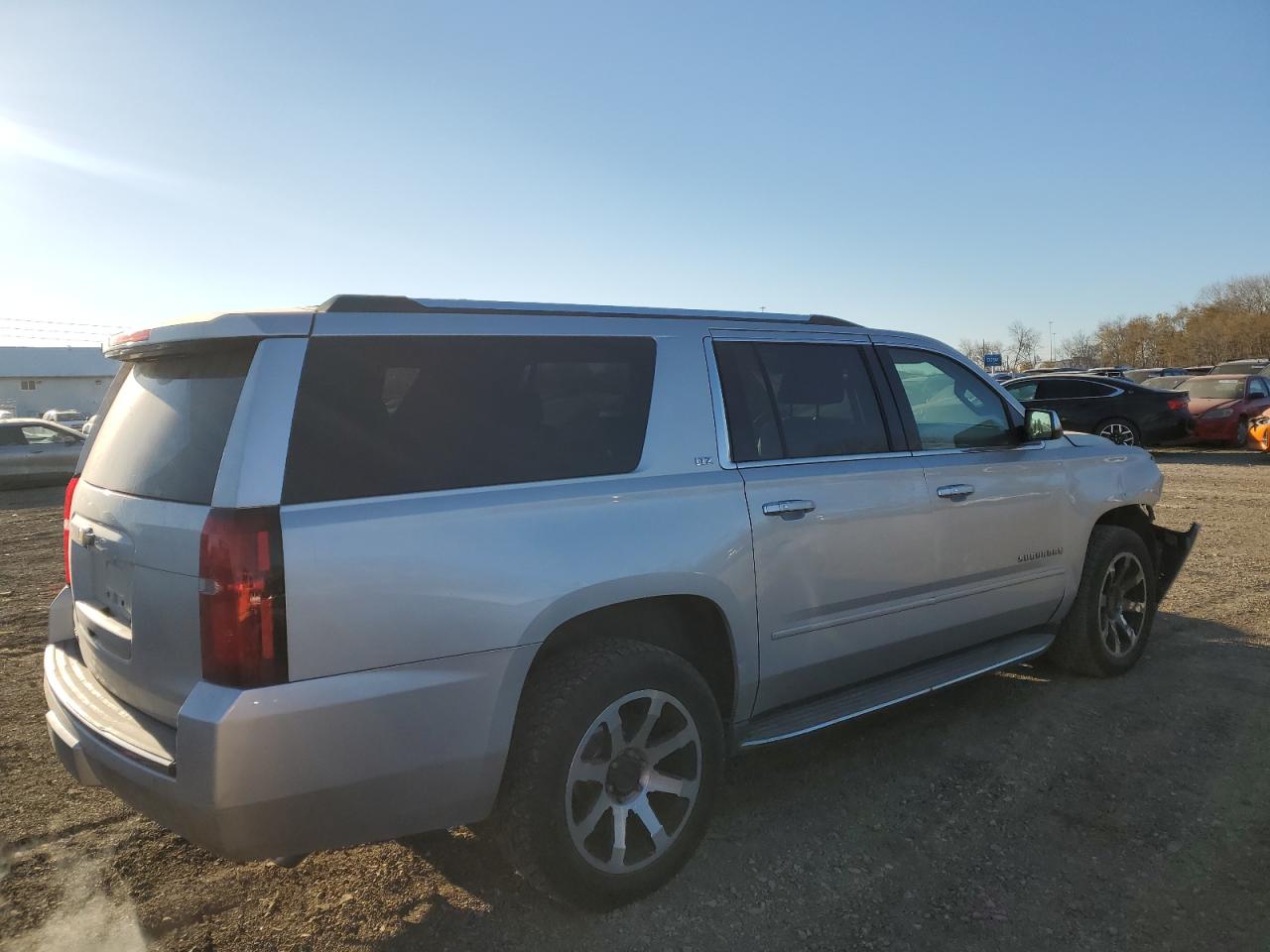 2015 Chevrolet Suburban VIN 1GNSKKKC3FR137399 Copart auction photo, front end damage thumbnail 3