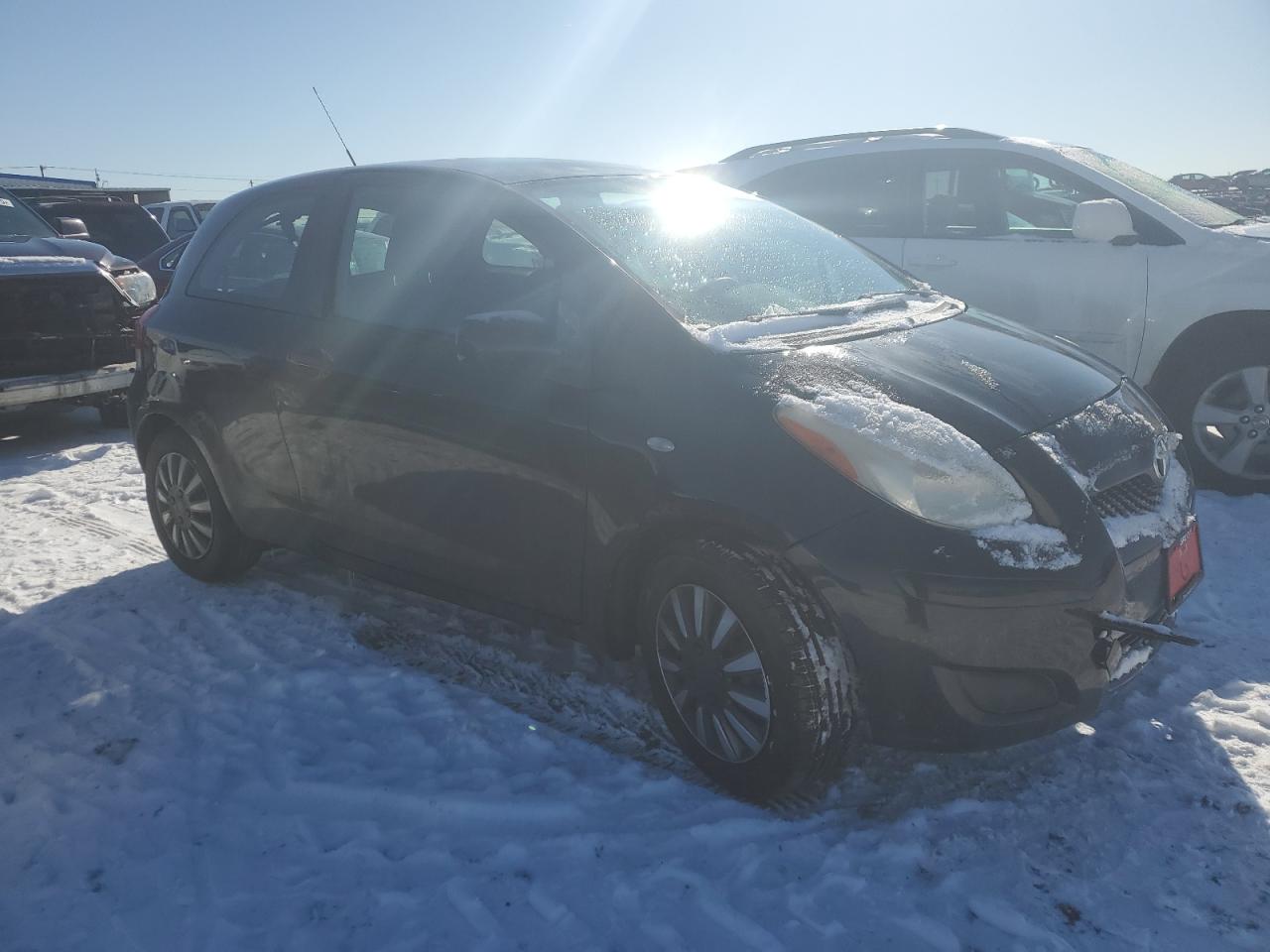 2011 Toyota Yaris VIN JTDJT4K39B5336620 Copart auction photo, front end damage thumbnail 4