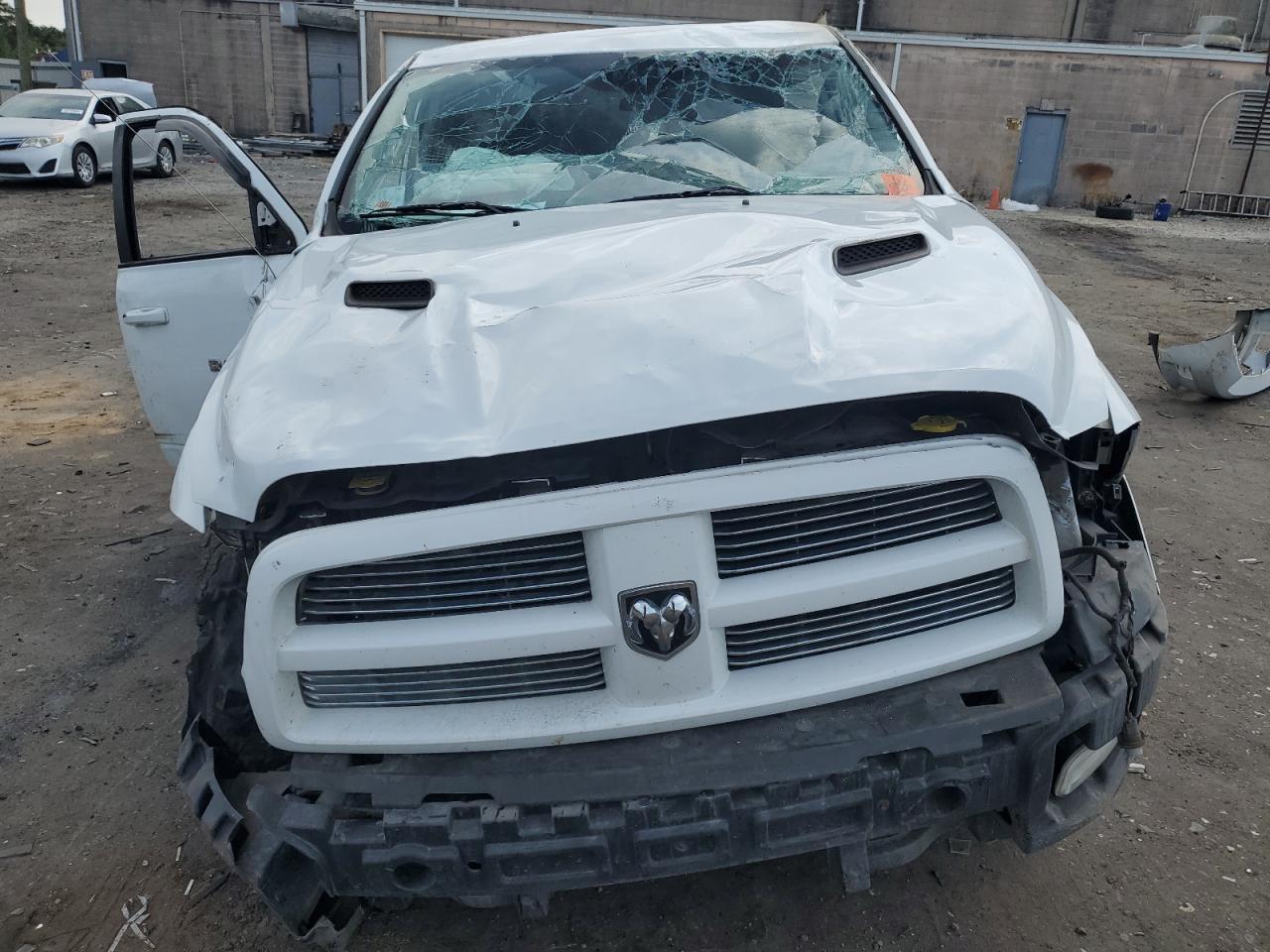 2011 Dodge RAM VIN 1D7RV1CTXBS624793 Copart auction photo, all over damage thumbnail 5