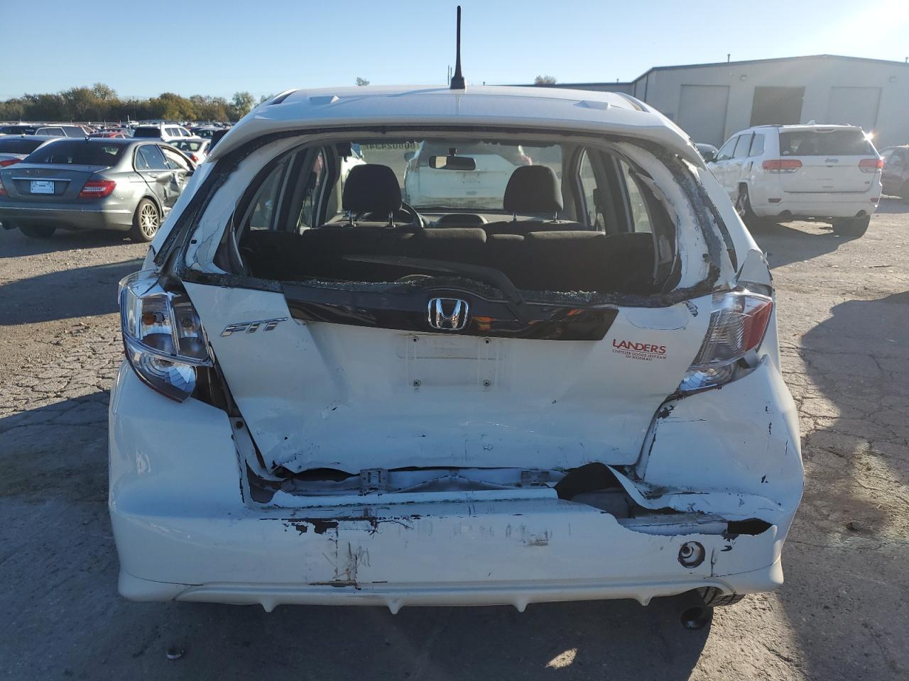 2011 Honda Fit VIN JHMGE8H63BC023246 Copart auction photo, rear end / minor dent/scratches damage thumbnail 6
