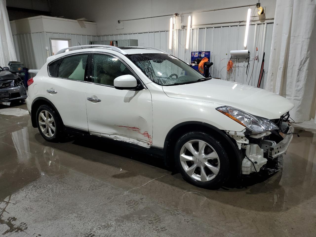 2010 Infiniti EX VIN JN1AJ0HR8AM750733 Copart auction photo, side / front end damage thumbnail 4