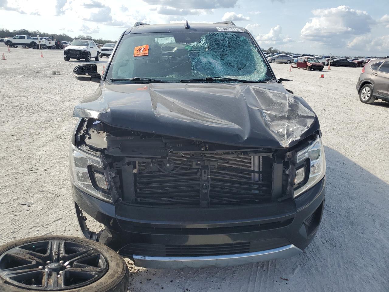 2021 Ford Expedition VIN 1FMJK1HT1MEA47707 Copart auction photo, side / front end damage thumbnail 5