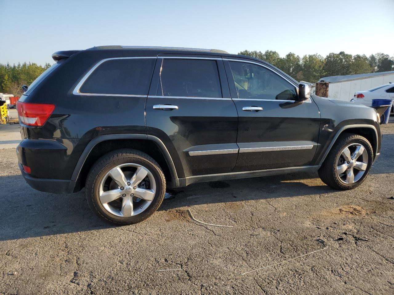 2011 Jeep Grand Cherokee VIN 1J4RS6GT5BC648076 Copart auction photo, front end damage thumbnail 3