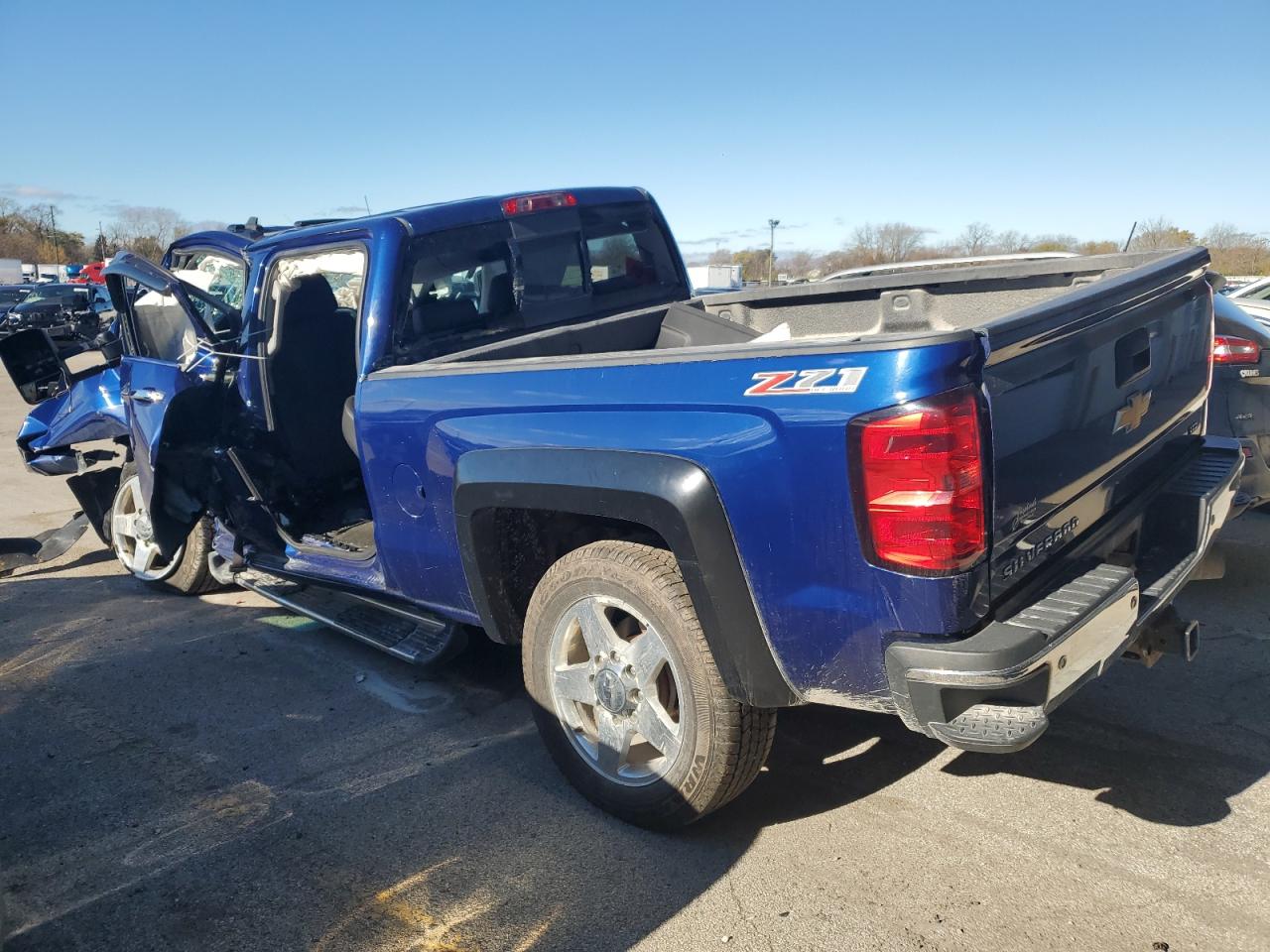 2015 Chevrolet Silverado VIN 1GC1KWE81FF161057 Copart auction photo, all over damage thumbnail 2
