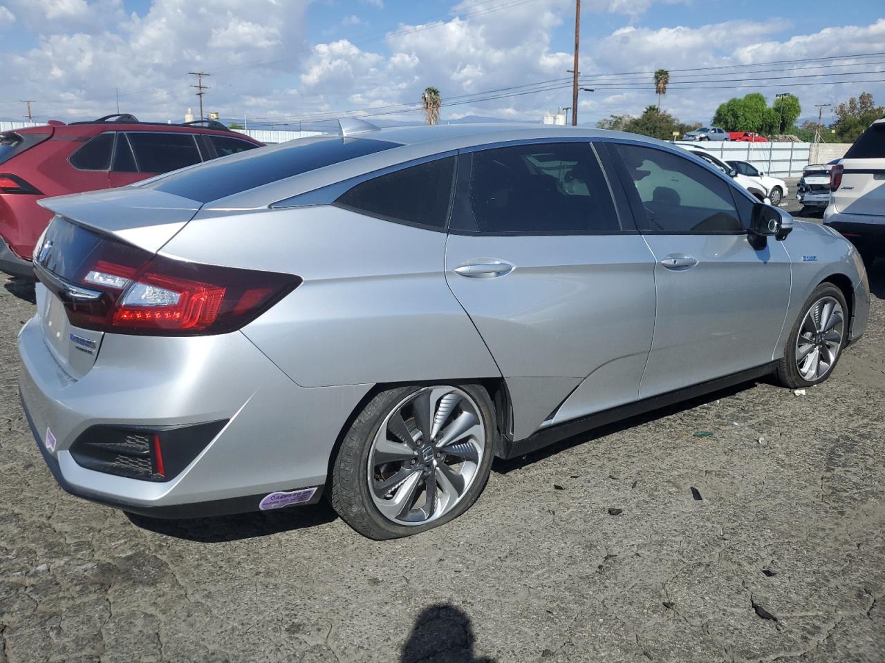 2018 Honda Clarity VIN JHMZC5F3XJC024303 Copart auction photo, side / front end damage thumbnail 3