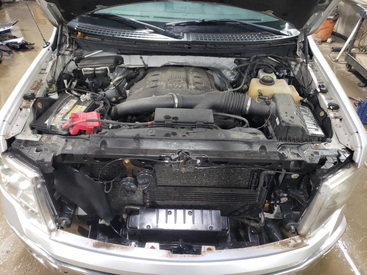 2012 Ford F-150 VIN 1FTFW1ET9CKD72057 Copart auction photo, front end / side damage thumbnail 11