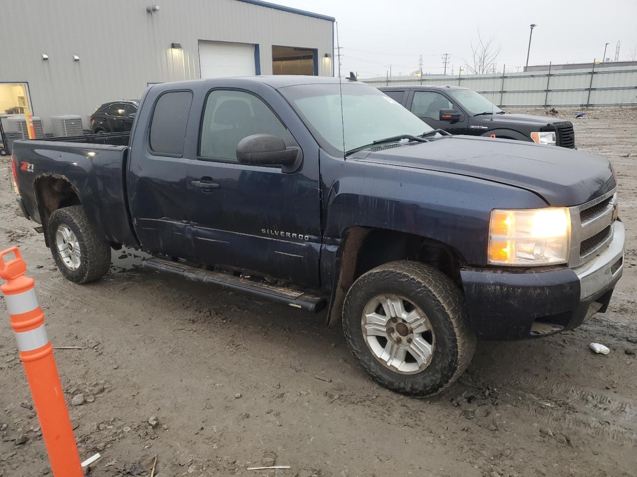 2011 Chevrolet Silverado VIN 1GCRKSE34BZ281010 Copart auction photo, side damage thumbnail 4