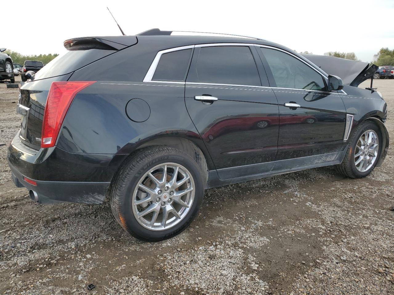 2014 Cadillac SRX VIN 3GYFNFE34ES659047 Copart auction photo, front end / minor dent/scratches damage thumbnail 3