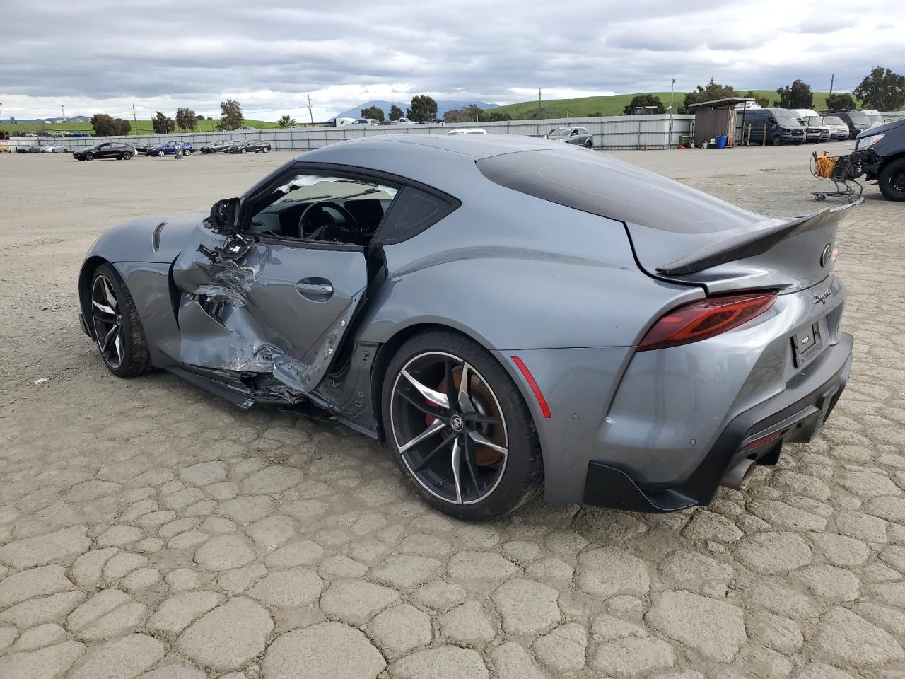 2022 Toyota Supra VIN WZ1DB0C00NW053830 Copart auction photo, side damage thumbnail 2