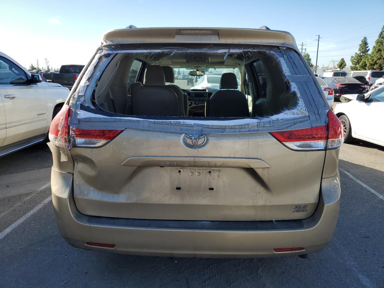 2012 Toyota Sienna VIN 5TDDK3DC1CS047993 Copart auction photo, rear end damage thumbnail 6