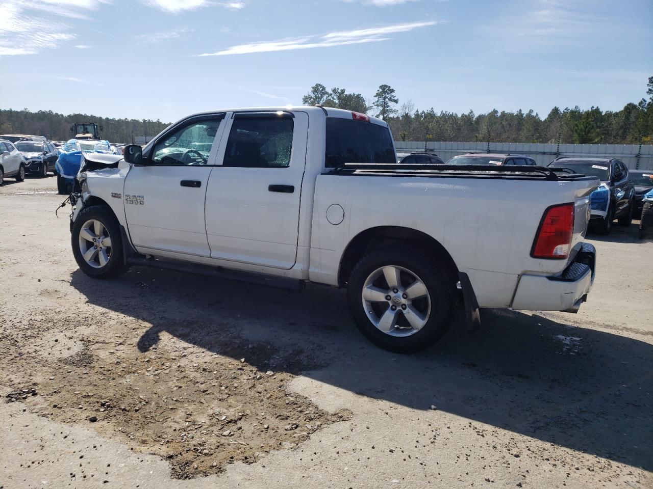 2015 RAM 1500 VIN 1C6RR6KTXFS762571 Copart auction photo, front end damage thumbnail 2