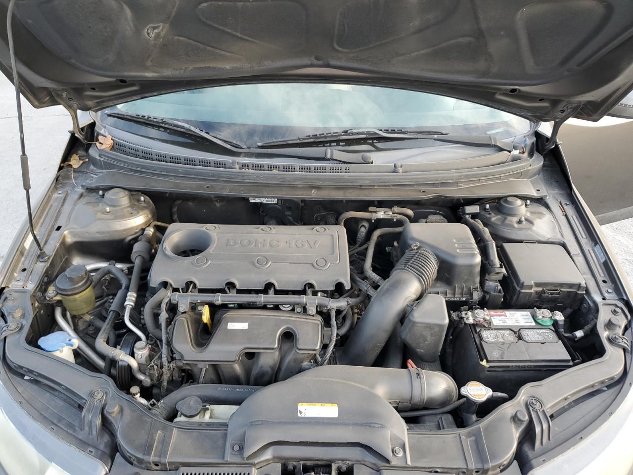 2010 KIA Forte VIN KNAFU4A29A5261215 Copart auction photo, all over damage thumbnail 11
