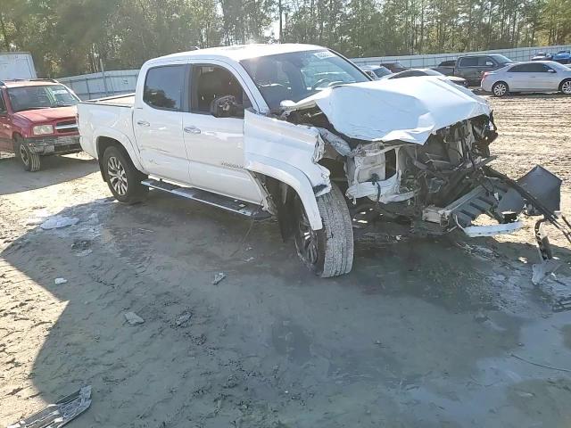 2020 Toyota Tacoma VIN 3TMEZ5CN3LM138357 Copart auction photo, side / front end damage thumbnail 11