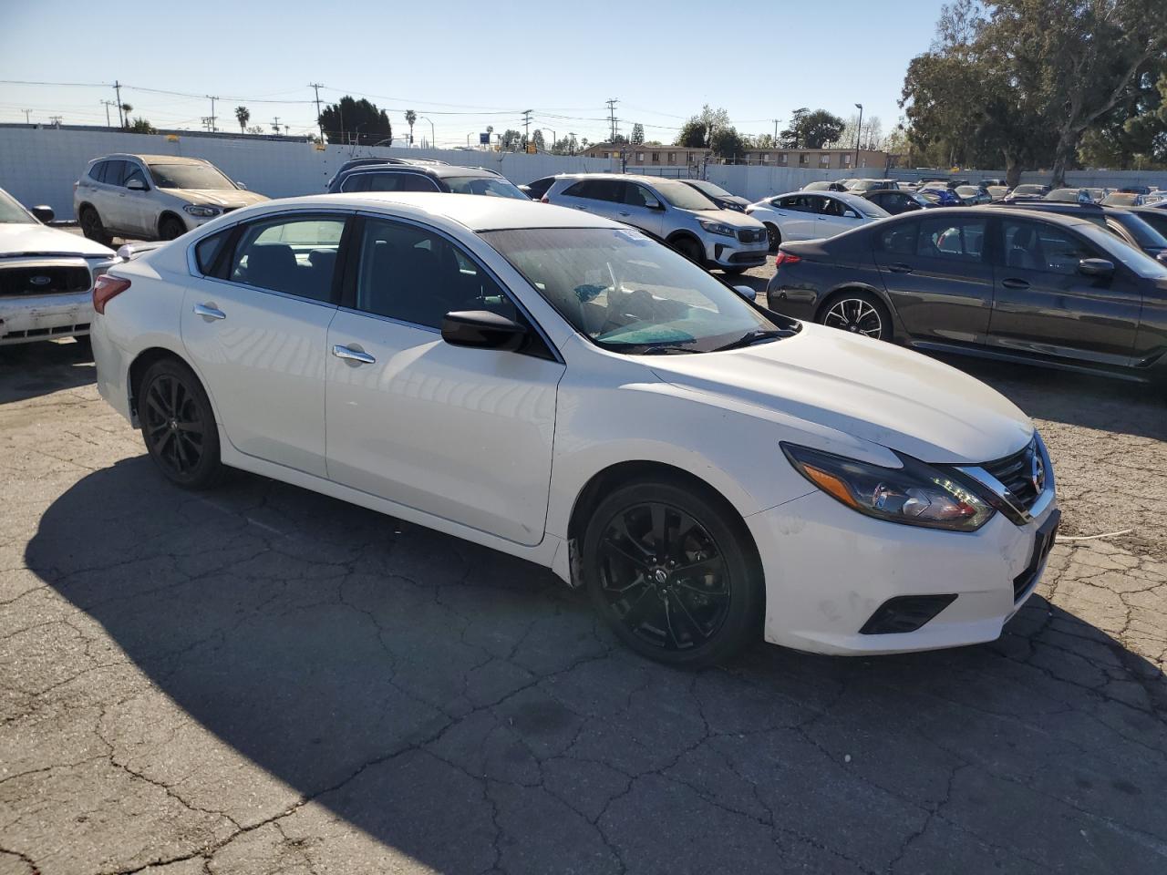 2017 Nissan Altima VIN 1N4AL3AP9HC495128 Copart auction photo, side / minor dent/scratches damage thumbnail 4