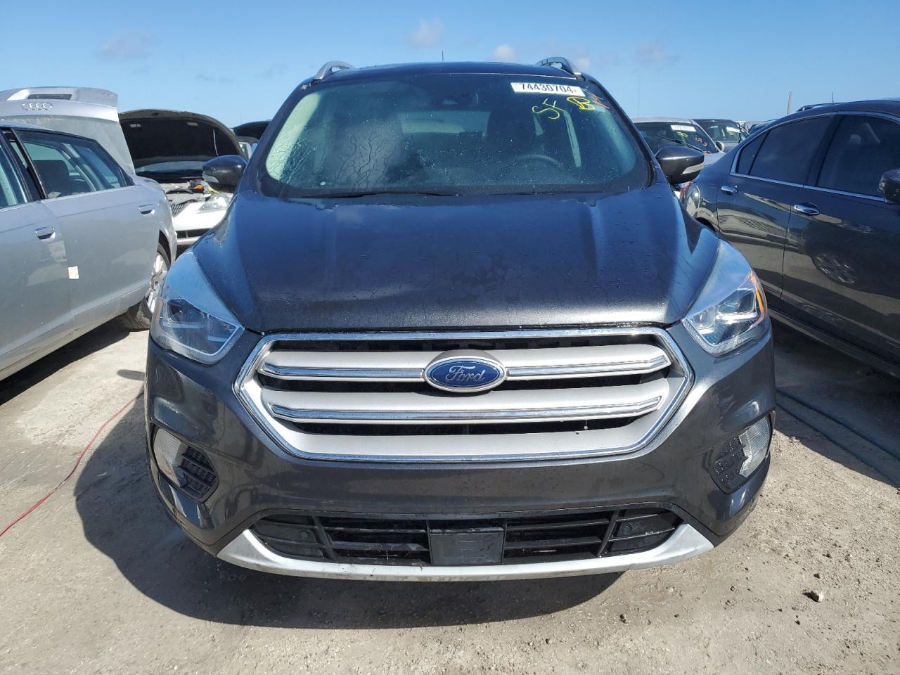 2019 Ford Escape VIN 1FMCU0J95KUB95132 Copart auction photo, water/flood damage thumbnail 5