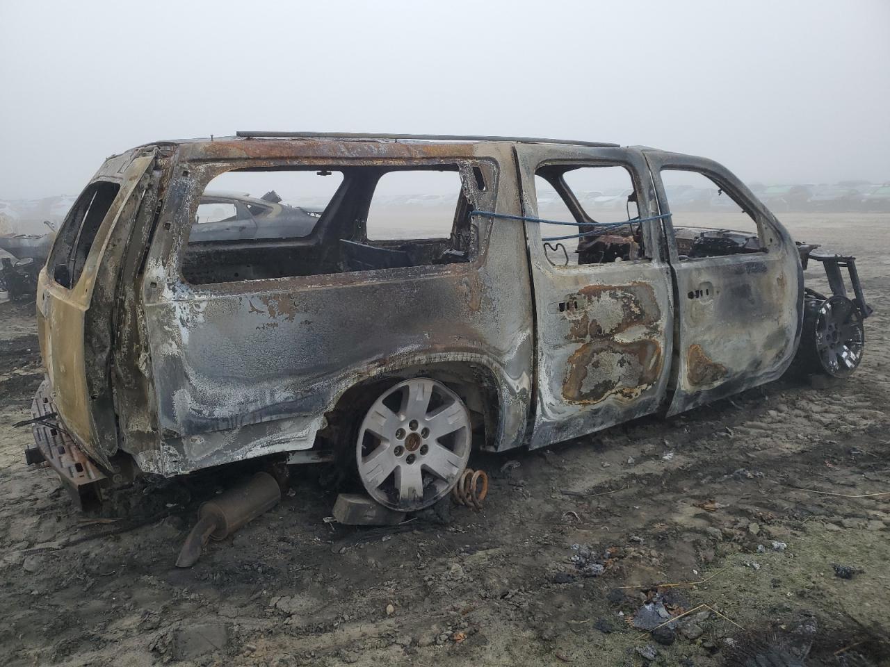 2011 Chevrolet Suburban VIN 1GNSKHE36BR368015 Copart auction photo, burn damage thumbnail 3