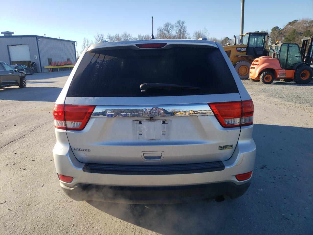 2011 Jeep Grand Cherokee VIN 1J4RS4GG0BC617972 Copart auction photo, front end / side damage thumbnail 6