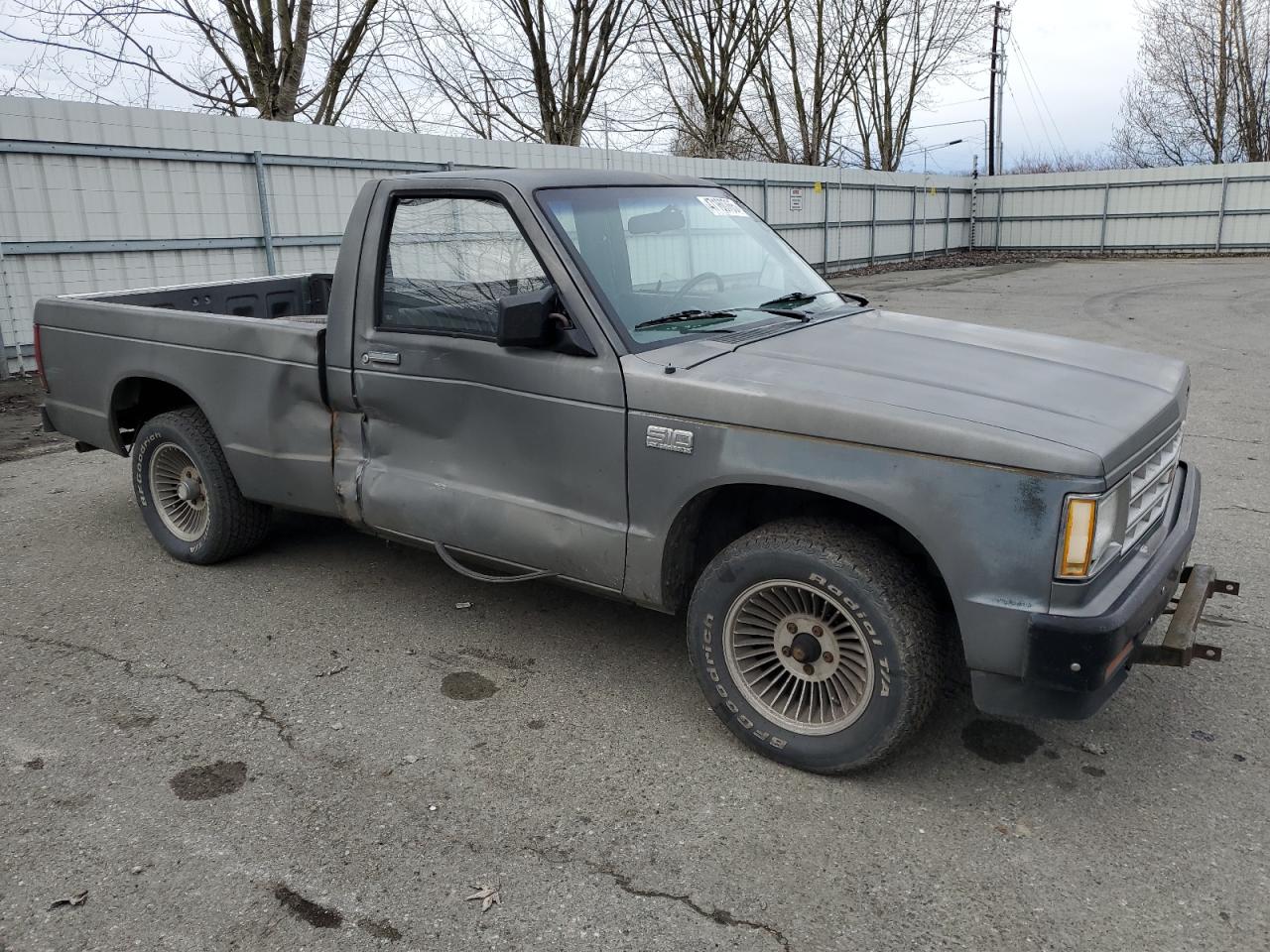 1988 Chevrolet S-10 Pickup VIN 1GCBS14E1J2210255 Copart auction photo, side damage thumbnail 4