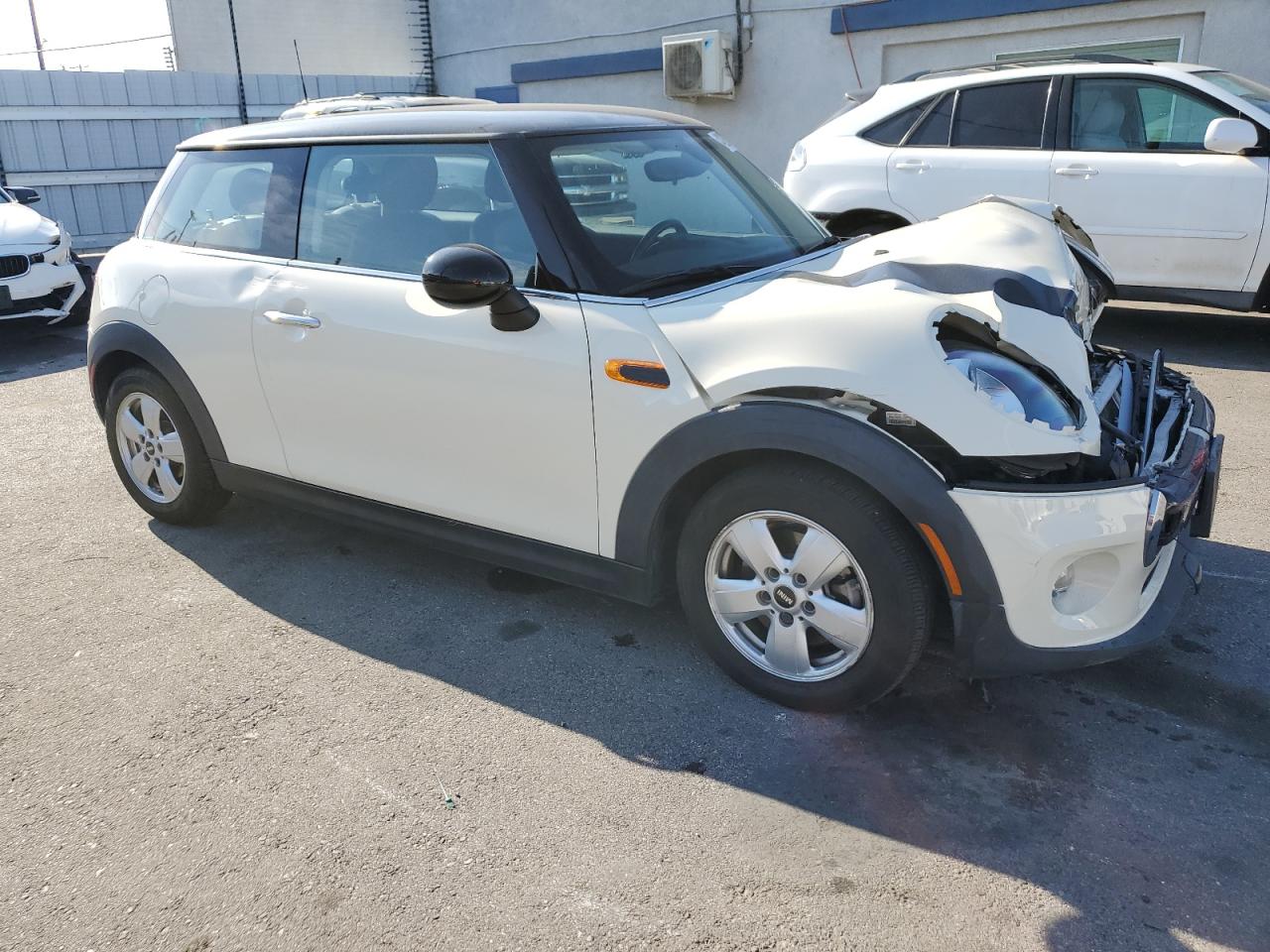 2015 MINI Cooper VIN WMWXM5C58F3A59604 Copart auction photo, front end / side damage thumbnail 4