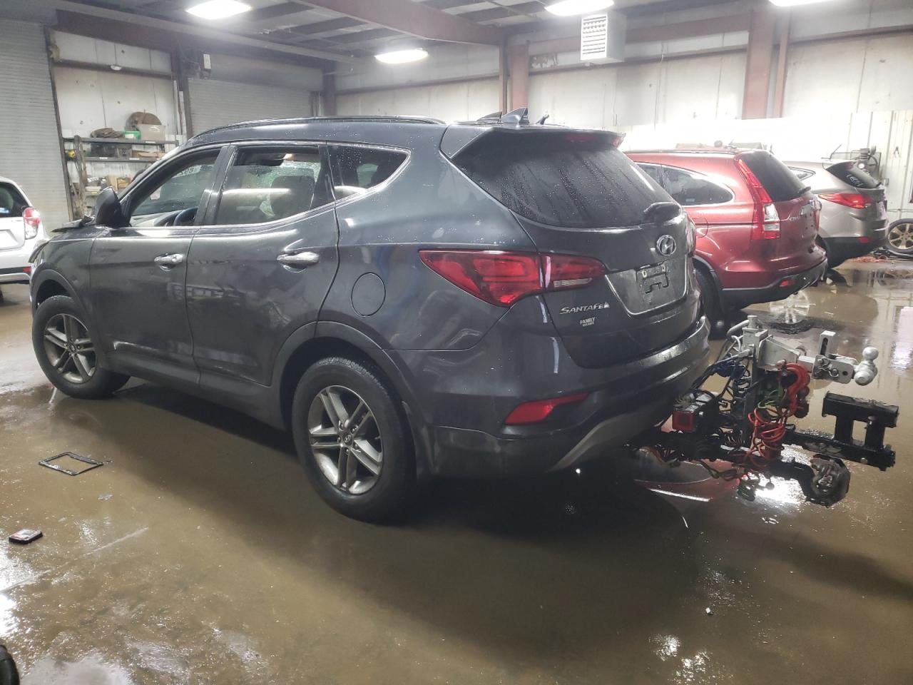 2017 Hyundai Santa Fe VIN 5XYZU3LB0HG461697 Copart auction photo, front end / side damage thumbnail 2