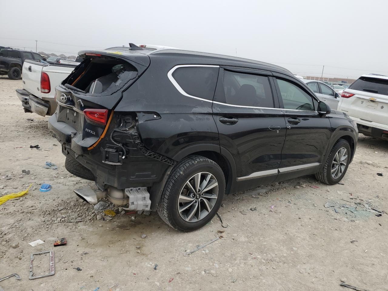 2019 Hyundai Santa Fe VIN 5NMS33ADXKH008242 Copart auction photo, rear end / minor dent/scratches damage thumbnail 3