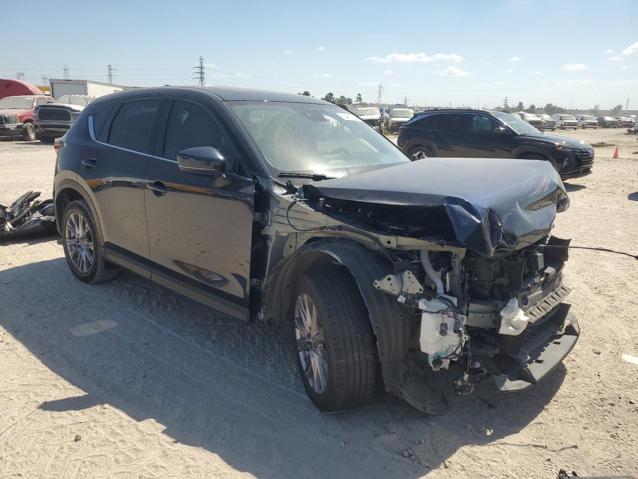 2019 Mazda CX-5 VIN JM3KFBDM3K0557849 Copart auction photo, front end damage thumbnail 4