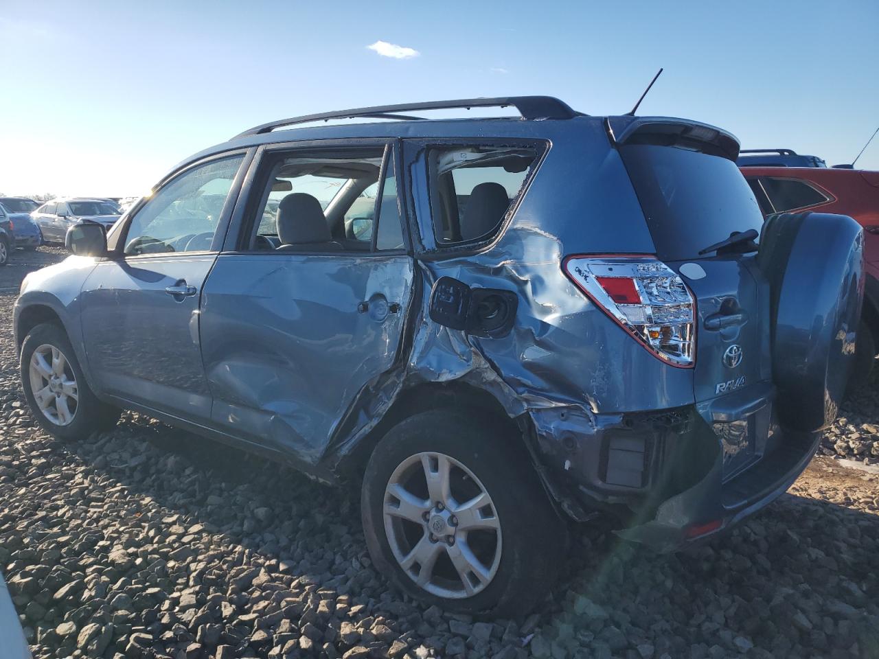 2012 Toyota RAV 4 VIN 2T3BF4DV9CW261356 Copart auction photo, side / rear end damage thumbnail 2