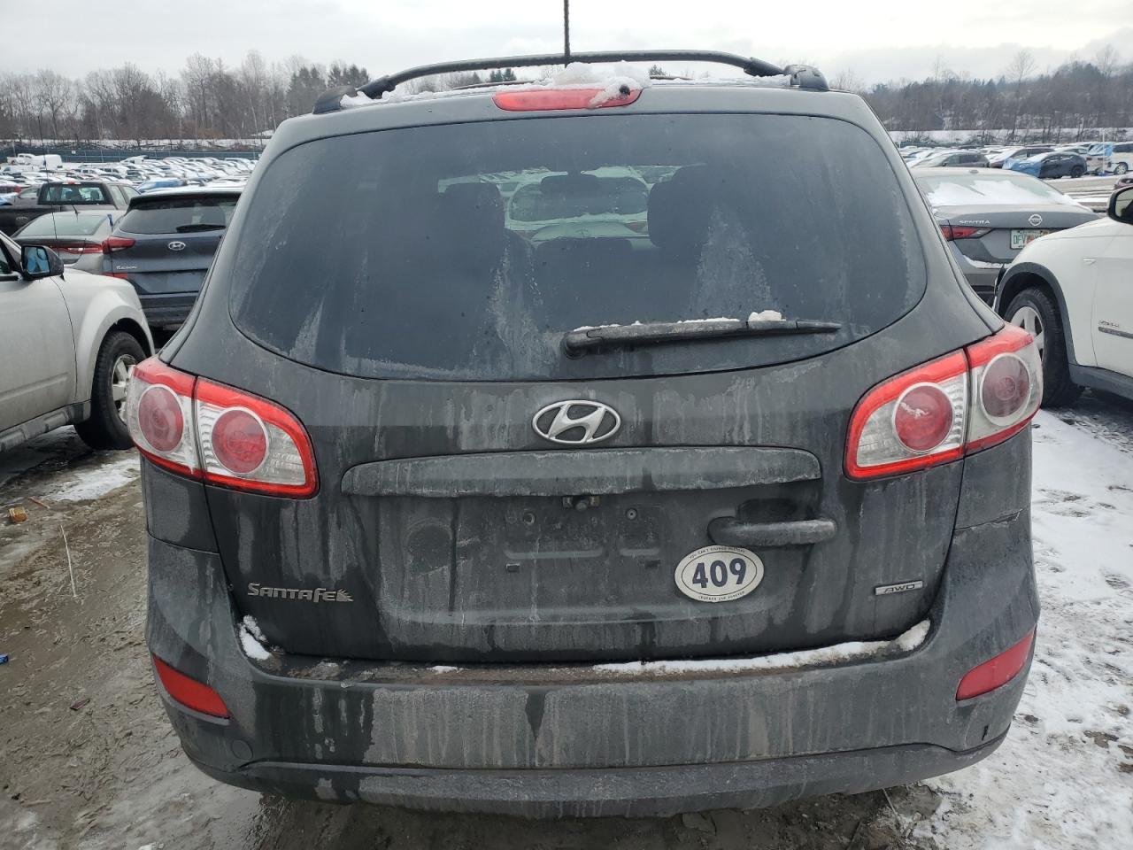 2012 Hyundai Santa Fe VIN 5XYZGDAB5CG133068 Copart auction photo, mechanical / minor dent/scratches damage thumbnail 6