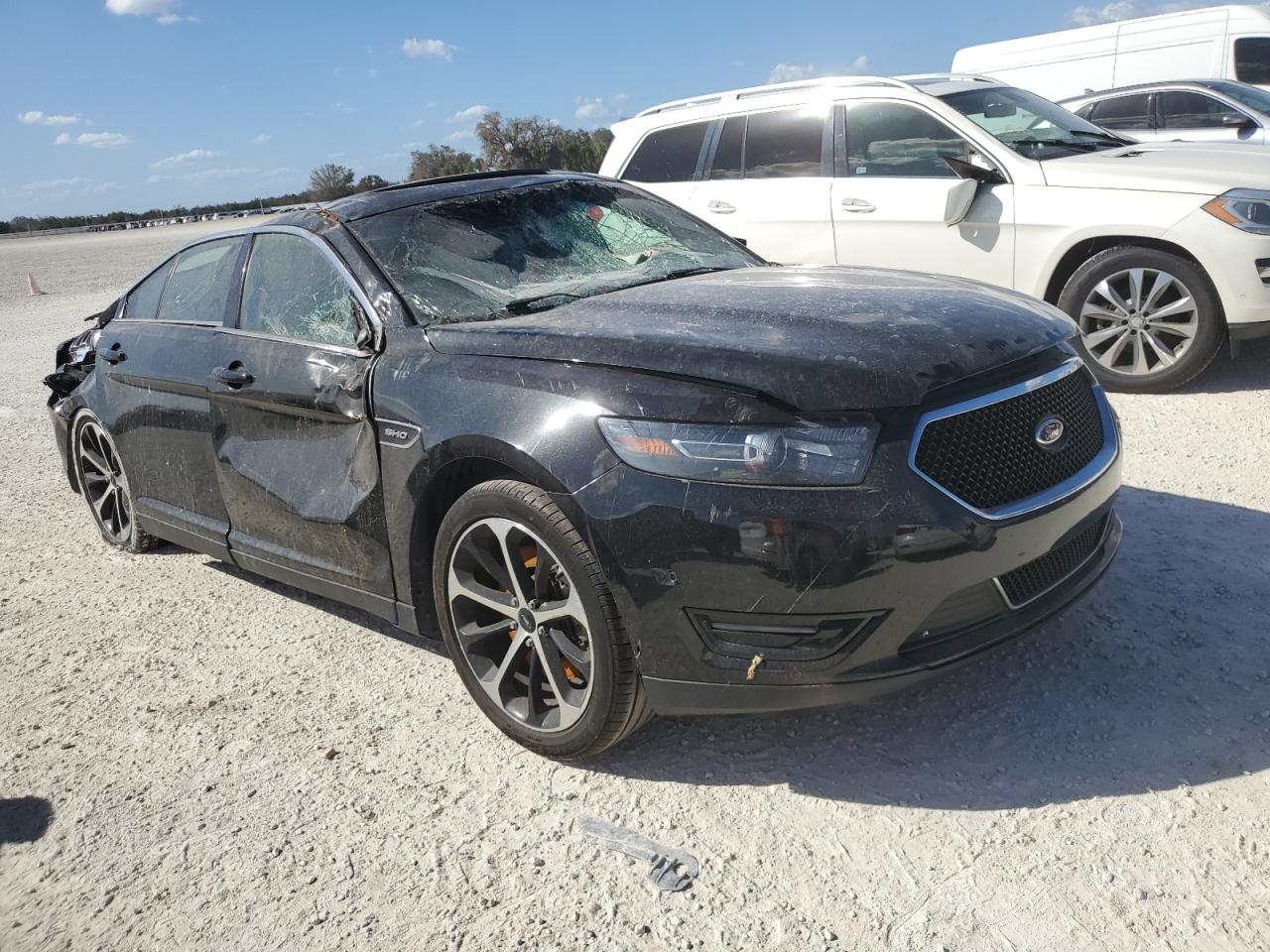 2014 Ford Taurus VIN 1FAHP2KT4EG160775 Copart auction photo, water/flood damage thumbnail 4